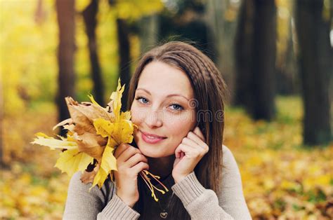 Autumn Girl Playing In City Park Fall Woman Portrait Of Happy Lovely