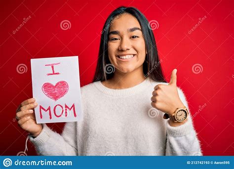 Young Beautiful Woman Holding Paper With Love Mom Message Celebrating Mothers Day Happy With Big