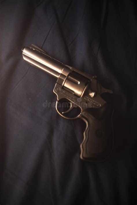 Pistol Gun On Bed Sheet Stock Image Image Of Security 233356521
