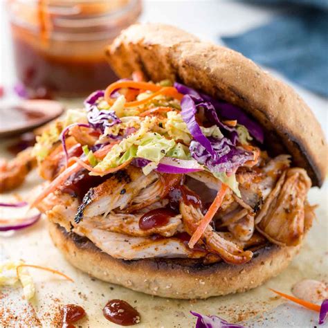 A quick and healthy weeknight meal that takes 30 minutes to throw together, with enough for leftovers to bring for lunch the next day! Pulled Chicken Sandwiches with Coleslaw - Jessica Gavin