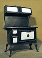 Antique Cast Iron Wood Stove with Enamel Fronts