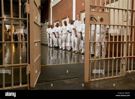 Male inmates at the Darrington Unit near Houston, Texas line up inside