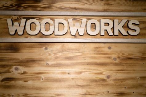 Woodworks Word Made Of Wooden Letters On Wooden Board Stock Photo