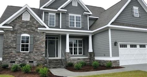 Stylishly Elegant Transform Your Home With A Grey House With Shutters