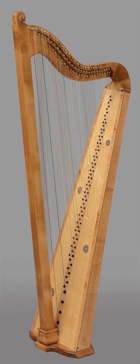 A Large Wooden Harp With Strings On It