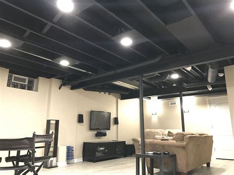 Exposed Basement Ceiling Painted Black Plywood Added Around Recessed