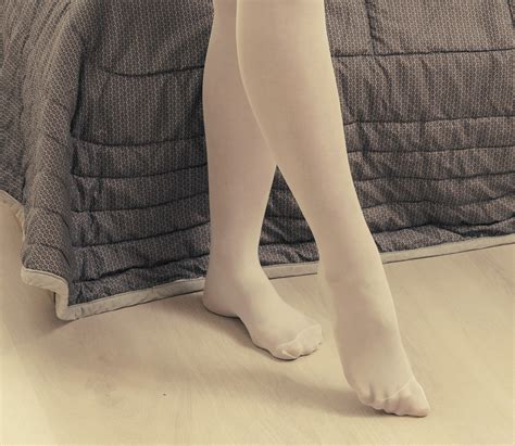 Women`s Legs And Feet In Tights Legs And Feet In Black And White Tights 49