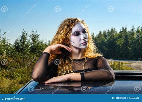 Zombie Girl With Black Eyes And A Bloody Mouth On Halloween Stock Image