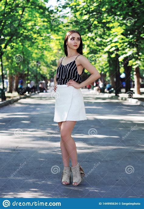 Young Girl Model Posing At Park Looking Left Stock Photo Image Of
