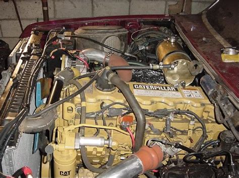 A mechanic can monitor fuel consumption information using online telematics system, remotely supervise technical condition of engine and fuel. Trucks Anonymous: CAT 3126 'C7' in a pickup