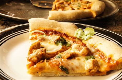 A quintessential british recipe and one that shouldn't rely on a phone call to the takeaway. Chicken Tikka Masala Pizza - Tara's Multicultural Table
