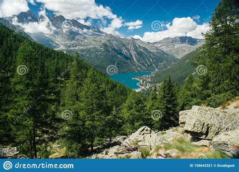 Mountain Lake Landscape With Conifer Of Fir And Larch Mountain Range