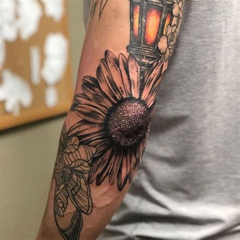 Butterfly on flower butterflies love flowers of all sizes. Club Tattoo on Instagram: sunflower tattoo at club tattoo ...