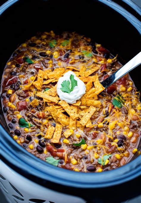 Just make a big pot of it in your slow cooker and have a topping bar with sour cream, cheese, avocado, chips, or whatever else your favorite toppings for tacos might be. Crock Pot Taco Soup - Life In The Lofthouse