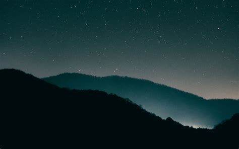 Download Wallpaper 1440x900 Starry Sky Mountains Night Radiance