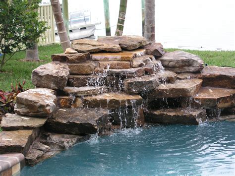 They complement other natural features as well, like plants and trees, and make great backdrops for pool fountains and waterfalls. Rock Water Fountains | Waterfalls | Piscinas de piedra ...