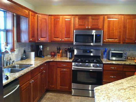 Even if you choose a monochromatic color scheme, you'll want at least several shades. Custom Natural Cherry Cabinets with Ornamental Brown ...