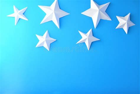 White Paper Stars On Blue Background Stock Photo Image Of Space