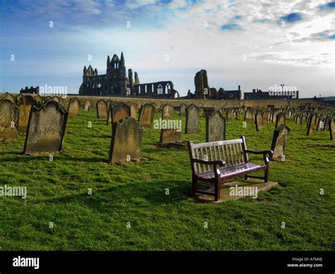 View Of Whitby Abbey Across Graveyard In St Marys Church Whitby North