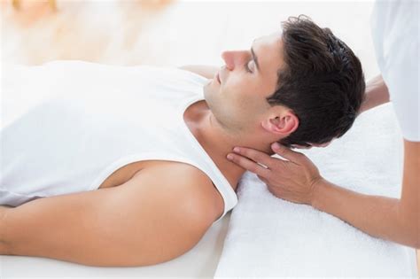 Free Photo Handsome Man Relaxed And Enjoying A Deep Tissue Back