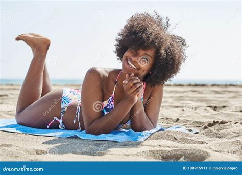 Pretty Afro American Woman Lying On Beach Smiling Stock Image Image