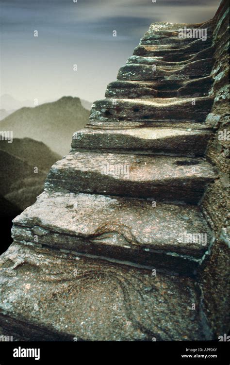 Ancient Worn Stone Steps Going Up And Mountains In The Background Stock