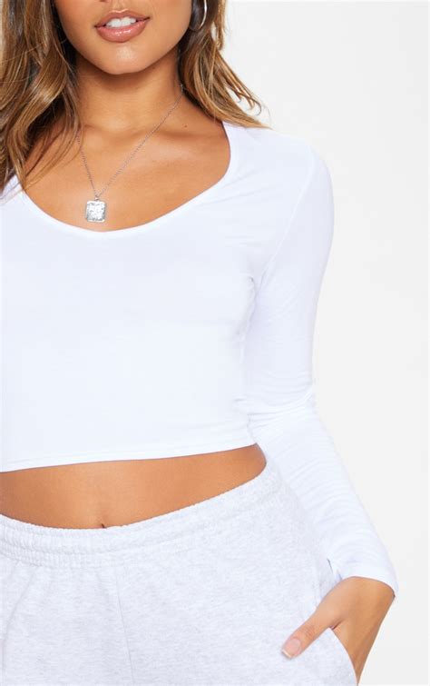 White Long Sleeve V Neck Crop Top Prettylittlething Usa