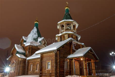 Church In Winter With Lights And Snow In The Night Norilsk Talnakh