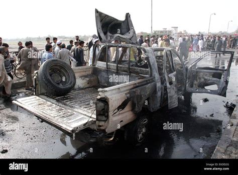Nangarhar St Aug Afghans Gather Around A Destroyed Police