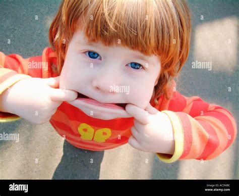 Little Girl Pulling Faces Hi Res Stock Photography And Images Alamy