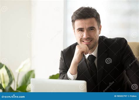 Smiling Attractive Businessman With Laptop Looking At Camera He Stock