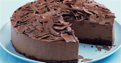 Stir the egg yolks and vanilla into the cooled chocolate until well combined. Milk chocolate mousse cake