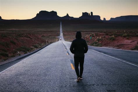 Human Person Walking In The Center Of The Road Person Image Free Photo