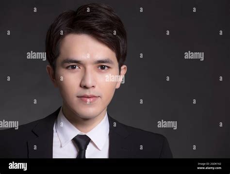 Young Asian Handsome Business Man In Black Suit Stock Photo Alamy