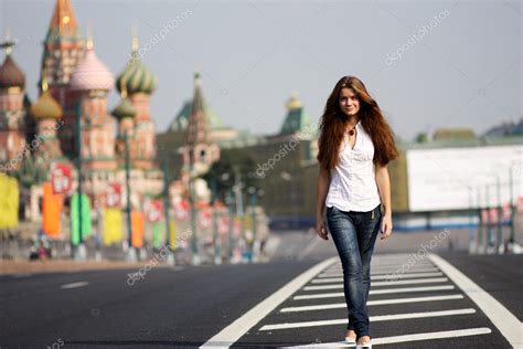Walking Woman In Blue Jeans Stock Editorial Photo © Arkusha 1321861