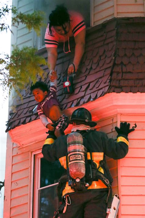 See Firefighter Saves Child Mother In Dramatic Fire Rescue Boston