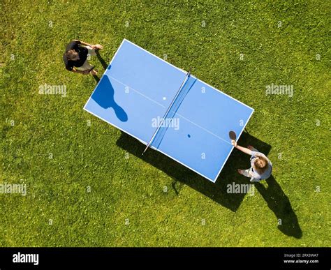 Aerial View People Playing Ping Pong Match Outdoor Top View Two Boys