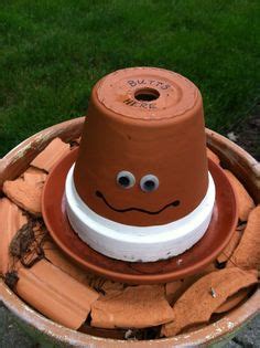 My boyfriend's brother who lives with us is a smoker. Outdoor ashtray for the smokers. So cute..."Put your butts ...