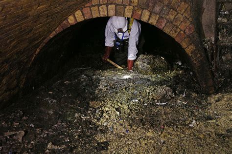 Thames Water Workers Remove Huge Fatbergs In London Sewer Under