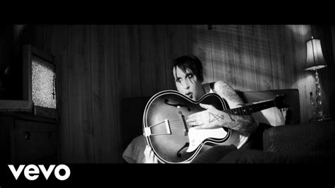 watch the video for marilyn manson s creepy cover of god s gonna cut you down all