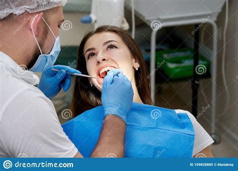 Woman Having Teeth Check Up At Dentist Office Stock Image Image Of Hook Clinic 199828885