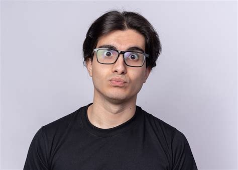 Free Photo Surprised Young Handsome Guy Wearing Black T Shirt And Glasses Isolated On White Wall