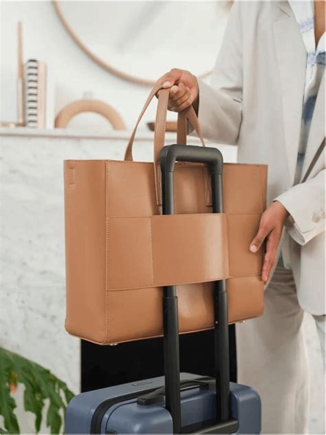 17 Best Travel Totes And Bags With A Trolley Sleeve — Sitesee