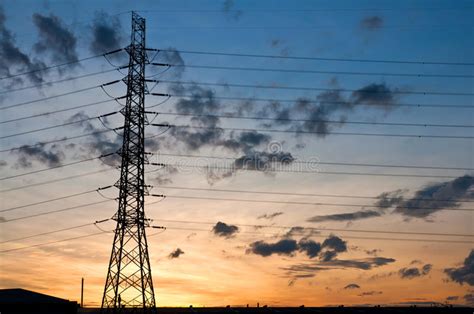 High Voltage Electricity Pylon On Sunset Stock Image Image Of