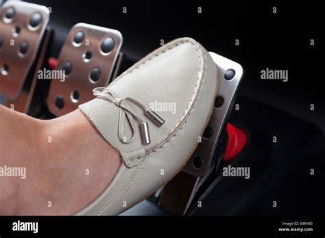 Womans Foot Pressing The Gas Pedal Stock Photo Alamy