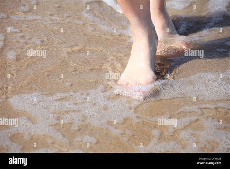 Nice Legs In Water Nice Pedicure Red Nail Sand Beach Stock Photo Alamy
