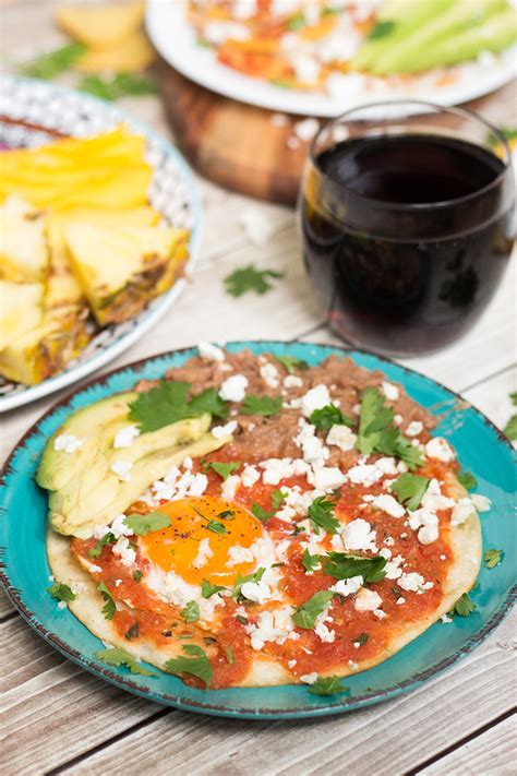 These are chilaquiles, a typical mexican breakfast that consists of red or green salsa poured over totopos, or corn tortillas cut in quarters and fried. Mexican Breakfast - Breakfast Around the World #5