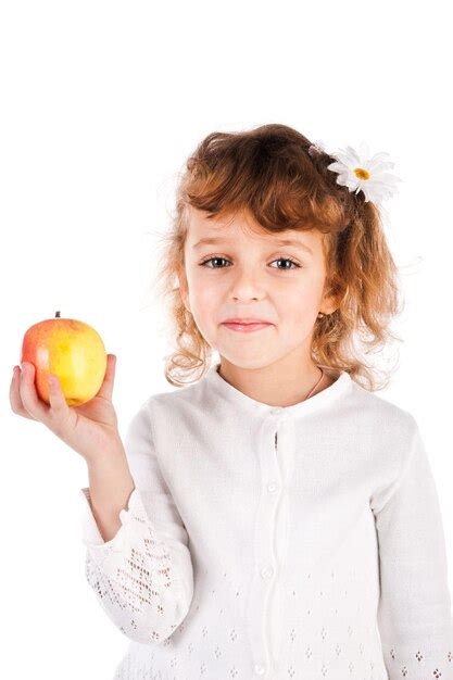 Premium Photo Girl Holding Apple Isolated On A White Background