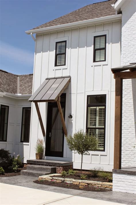Blending exterior window colours with your siding can make an enormous difference to coordinating the exterior of your home and creating a professionally finished look. white house, black trim windows | exterior inspiration ...