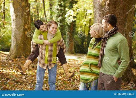 Young Friends Having Fun In Autumn Park Stock Image Image Of Enjoying